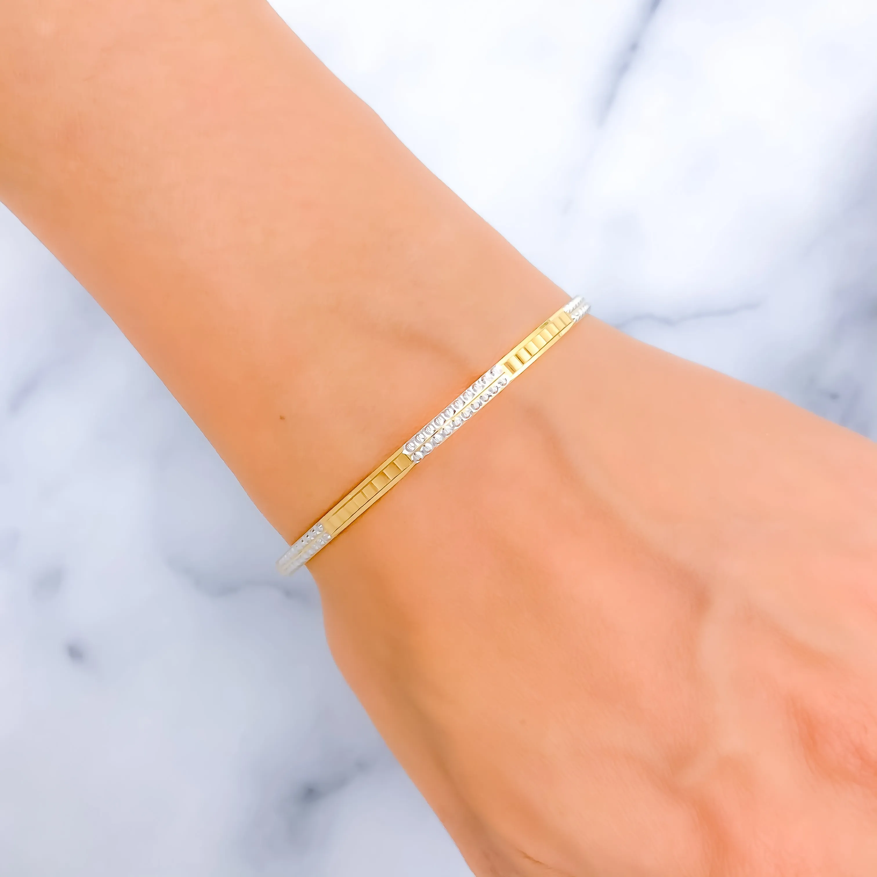 Alternating Glistening Two-Tone 22k Gold Bangle